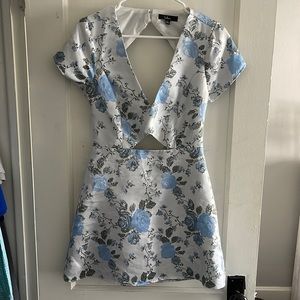 Size small Lulus dress with cut out back. Great wedding guest dress